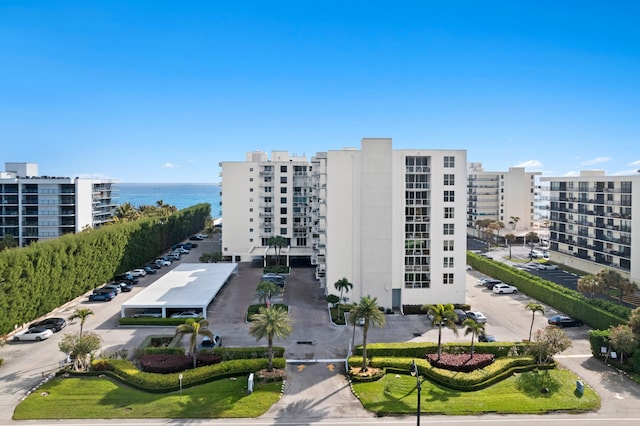 view of building exterior with a water view