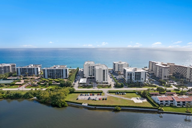 birds eye view of property featuring a water view