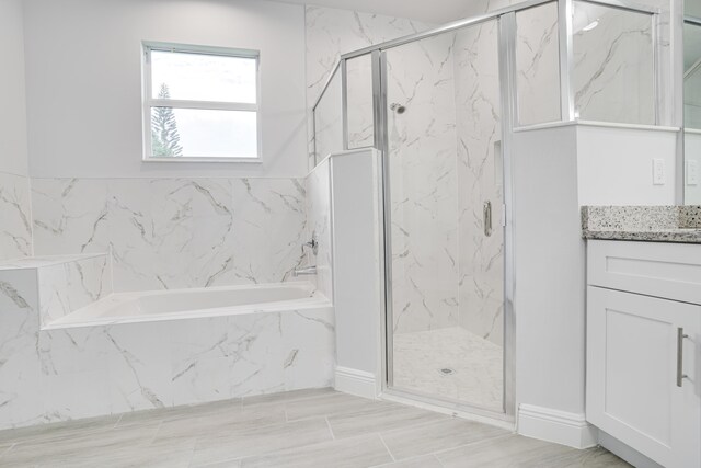 325 SW Majestic Ter, Port Saint Lucie, FL 34984 - bathroom featuring vanity and plus walk in shower