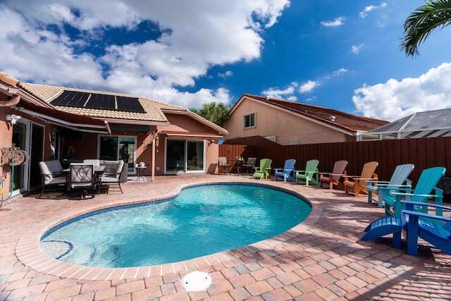 view of pool with a patio