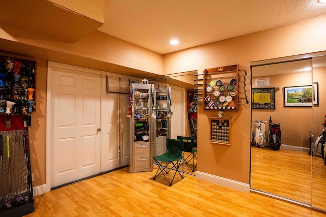 interior space with hardwood / wood-style floors