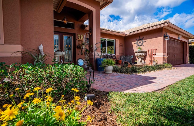 property entrance featuring a garage