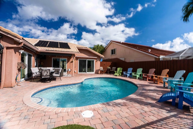 view of pool featuring a patio area