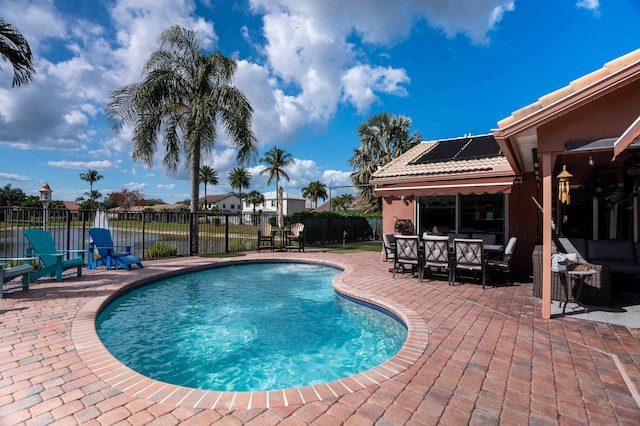 view of swimming pool with a patio area