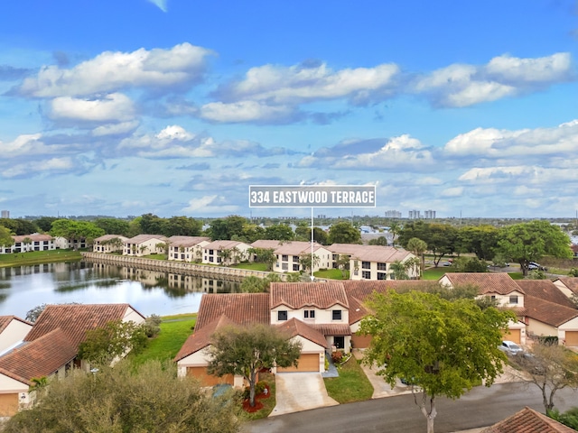 drone / aerial view featuring a water view