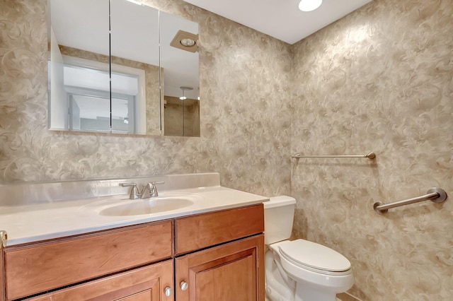 950 Flanders T, Delray Beach, FL 33484 - bathroom featuring vanity and wallpapered walls