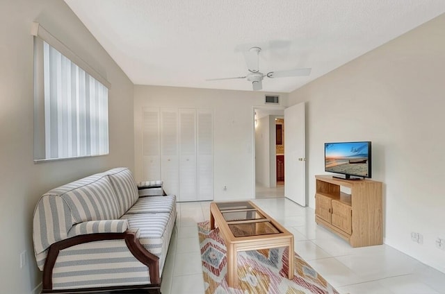 950 Flanders T, Delray Beach, FL 33484 - living area with light tile patterned flooring and a ceiling fan