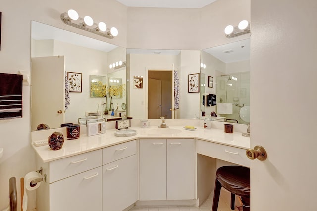 bathroom with vanity and walk in shower