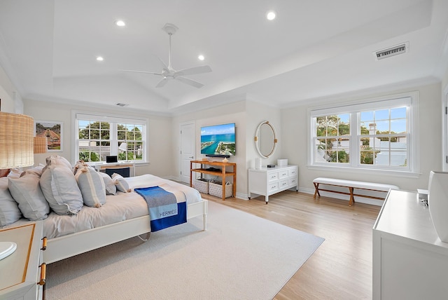 bedroom with light wood finished floors, visible vents, a ceiling fan, vaulted ceiling, and recessed lighting