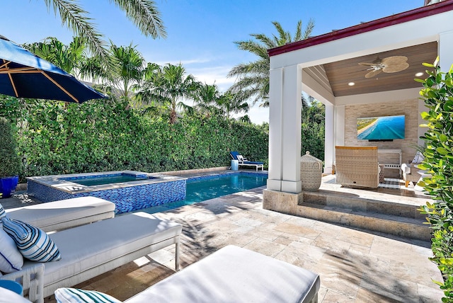 view of pool featuring a fenced in pool, ceiling fan, an in ground hot tub, and a patio area