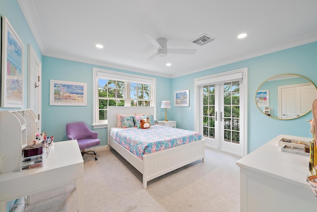 bedroom with access to exterior, french doors, visible vents, ornamental molding, and light carpet