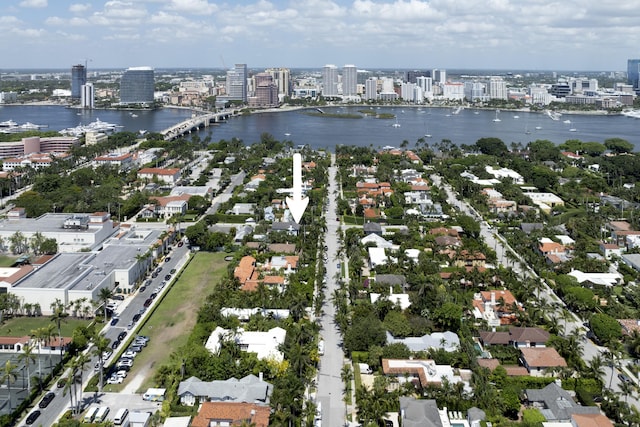 drone / aerial view with a water view and a city view