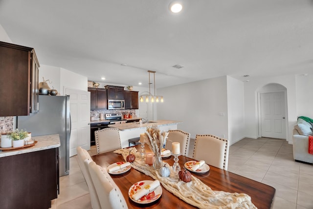 tiled dining space with sink