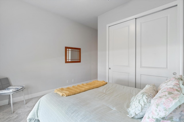 carpeted bedroom with a closet