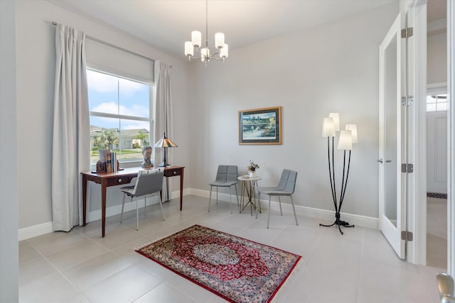 office with light tile patterned flooring and a notable chandelier