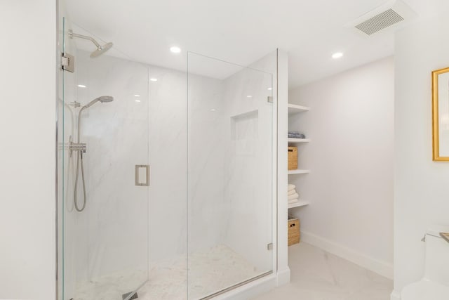 bathroom featuring walk in shower