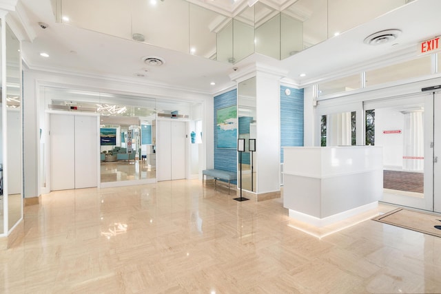 bathroom featuring plenty of natural light, ornamental molding, and elevator