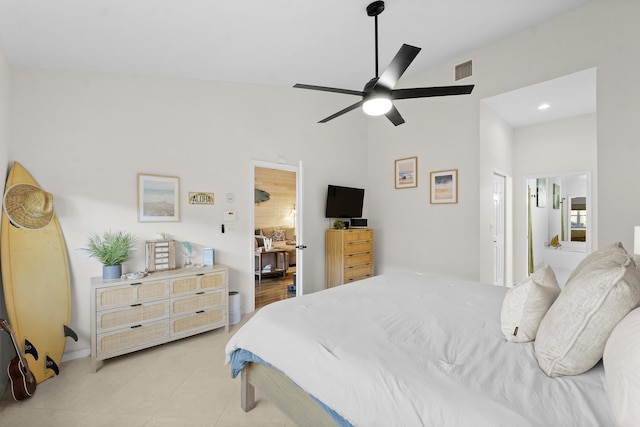 bedroom featuring ceiling fan and ensuite bathroom