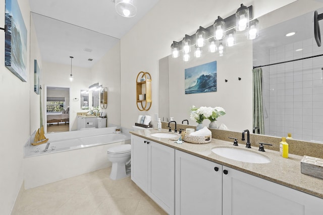 full bathroom featuring tile patterned flooring, vanity, toilet, and separate shower and tub