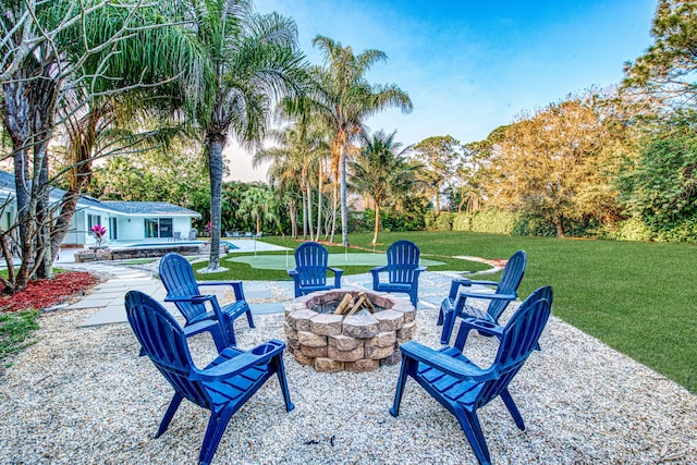 view of patio / terrace featuring an outdoor fire pit