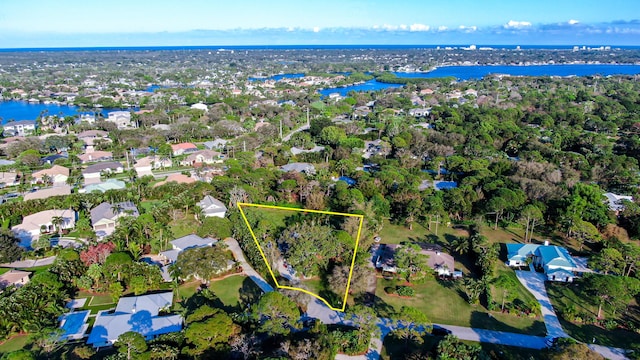 aerial view with a water view and a residential view