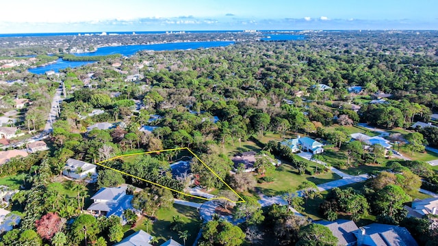 aerial view with a water view and a residential view