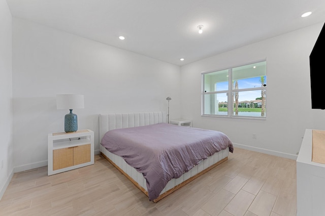 bedroom with light wood-type flooring