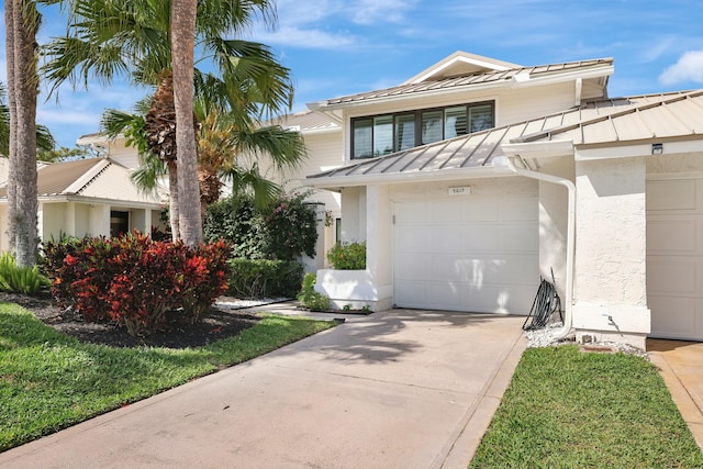 view of front of home with a garage