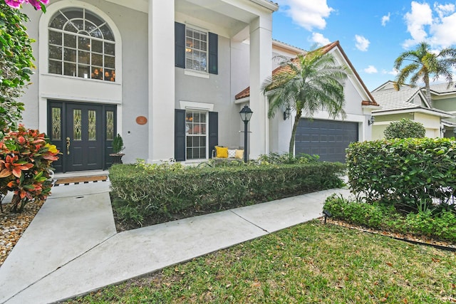 view of front of home with a garage