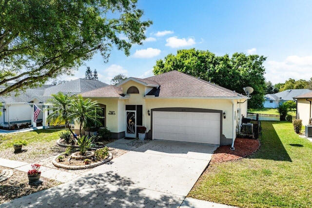 single story home featuring driveway, an attached garage, stucco siding, central AC unit, and a front yard