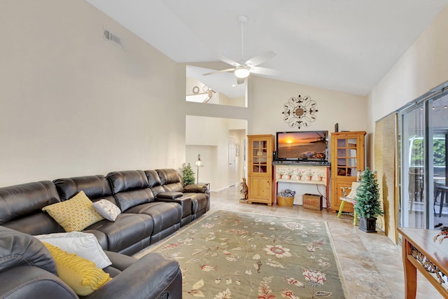 living room with ceiling fan and high vaulted ceiling