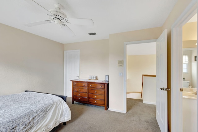 bedroom with light colored carpet and ceiling fan