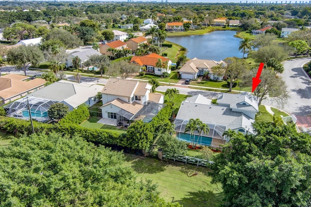 drone / aerial view with a water view