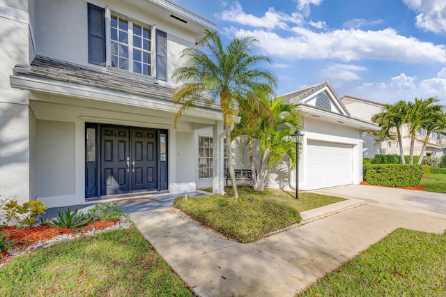 view of front of home with a garage