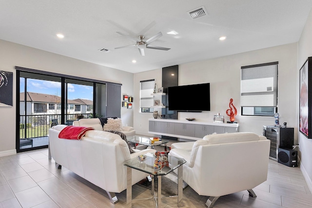 living room featuring ceiling fan