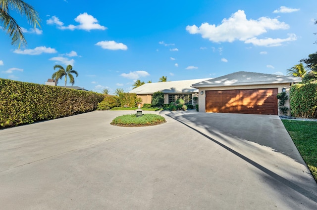 ranch-style home with a garage