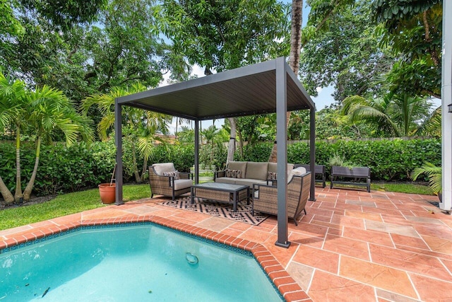 view of swimming pool featuring an outdoor living space and a patio