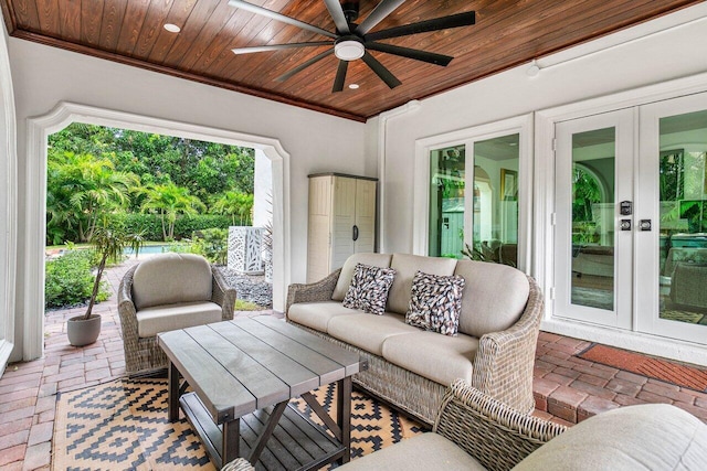 view of patio / terrace with outdoor lounge area, french doors, and ceiling fan