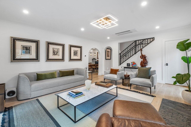 living room with light hardwood / wood-style flooring