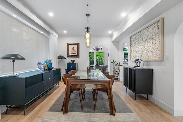 dining area featuring light wood-type flooring