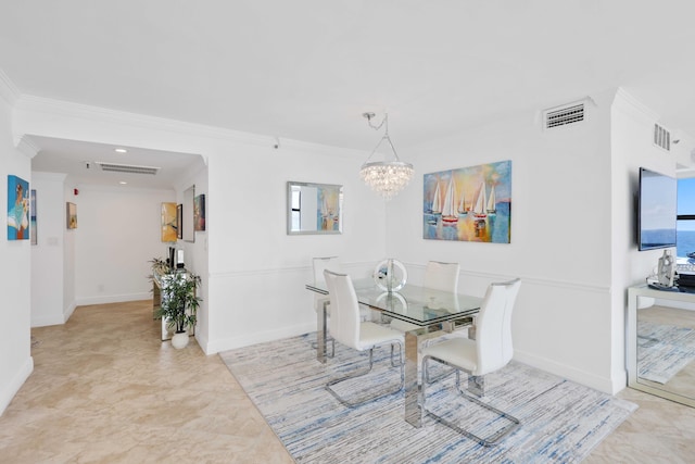 dining space featuring ornamental molding and a chandelier