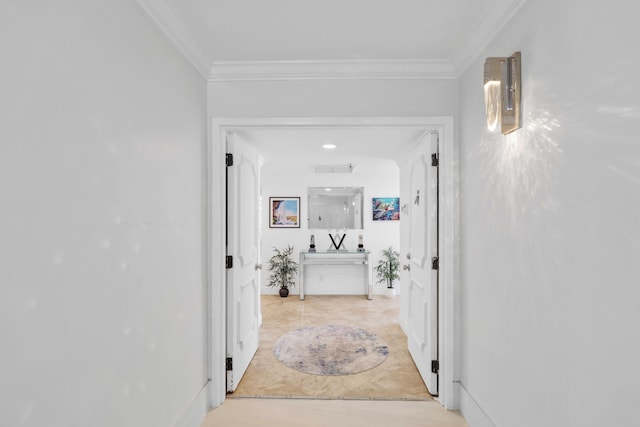 hallway featuring crown molding