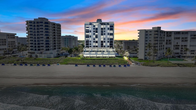 outdoor building at dusk with a water view