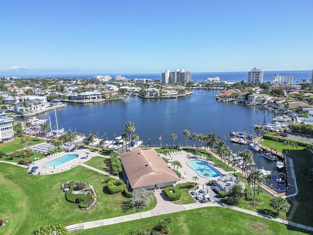 bird's eye view featuring a city view and a water view