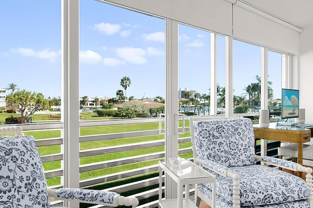 sunroom / solarium featuring plenty of natural light