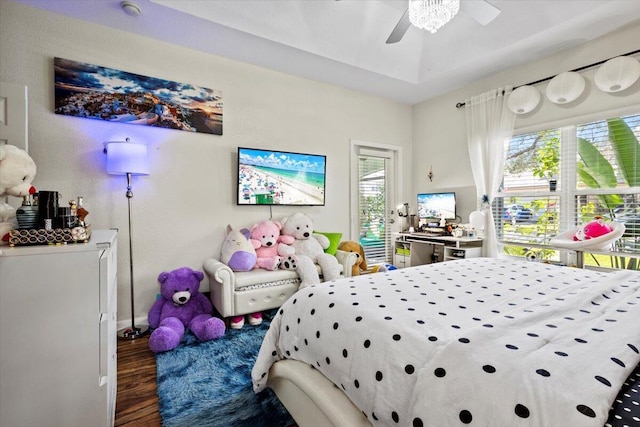 bedroom with hardwood / wood-style floors and ceiling fan