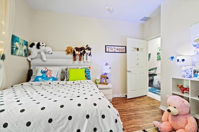 bedroom featuring wood-type flooring