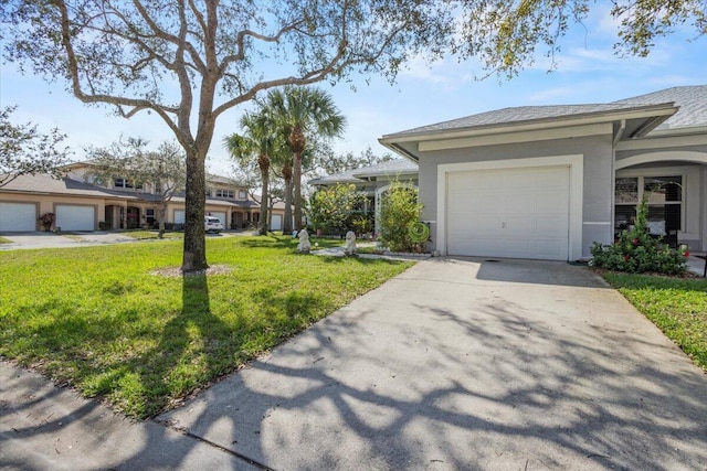 exterior space with a yard and a garage