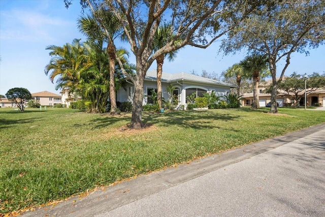 view of front of home featuring a front lawn