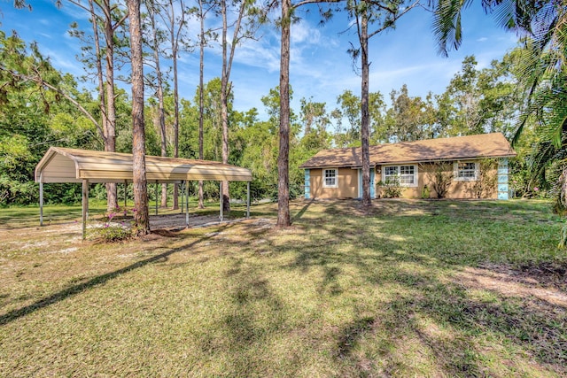 view of yard with a carport